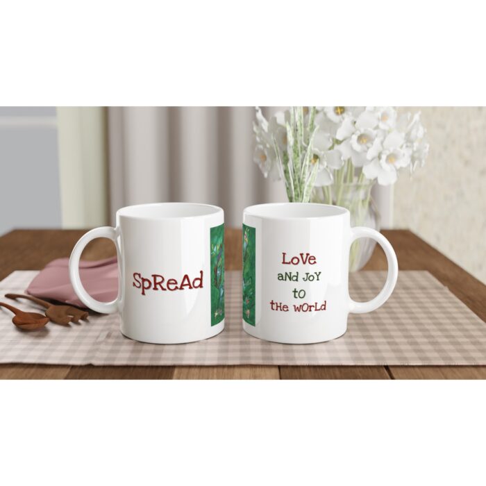 Vit keramisk mugg med motiv och text 325 ml - Spread love and joy to the world